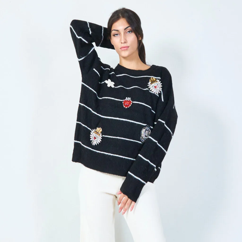 Cozy knit sweater with floral appliqués wholesale