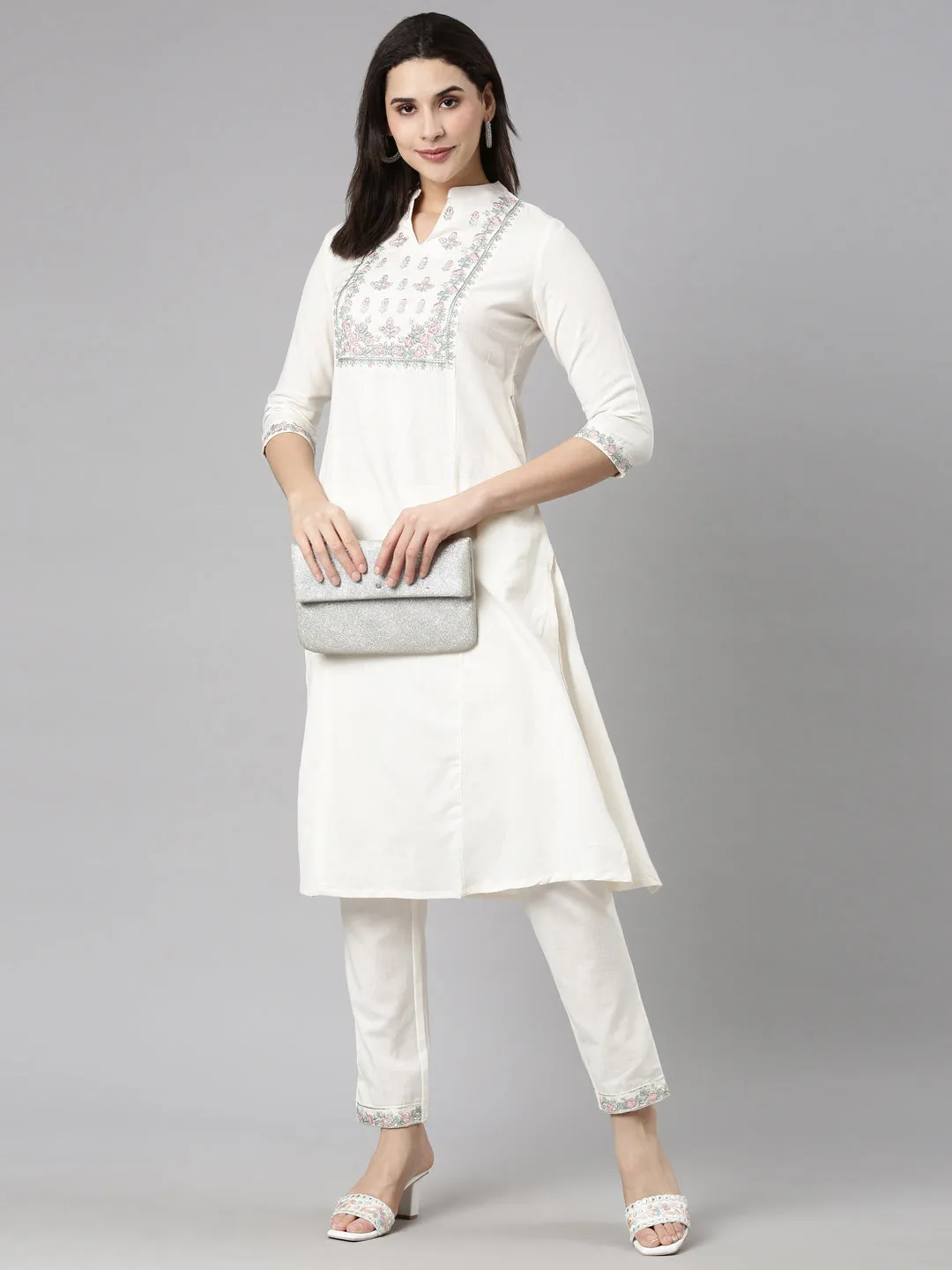 Neerus Cream Regular Straight Solid Kurta And  Trousers